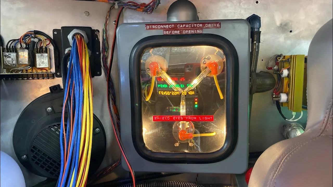 The glowing flux capacitor behind the seats