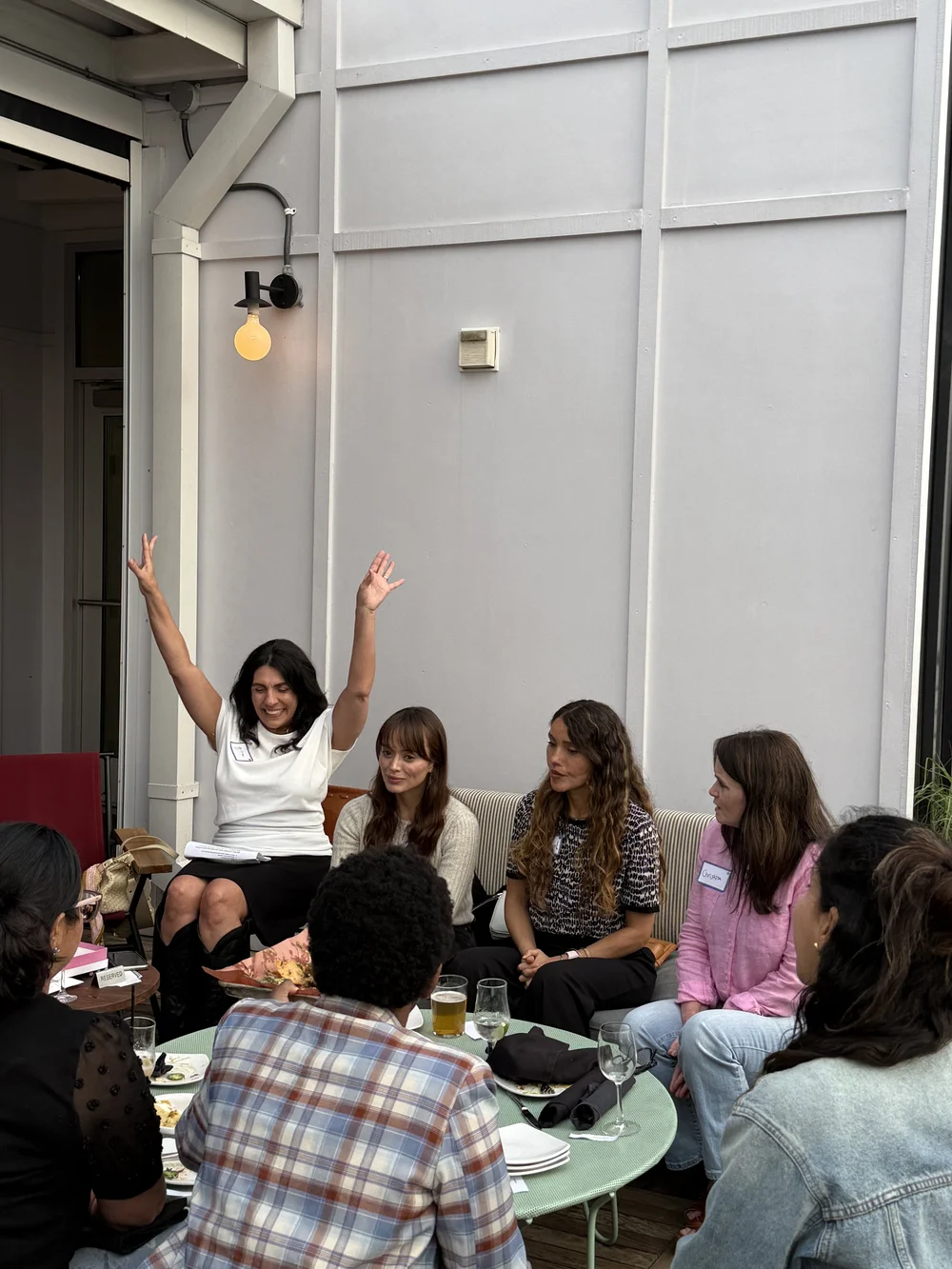 Gina celebrating with women at The Women's Social