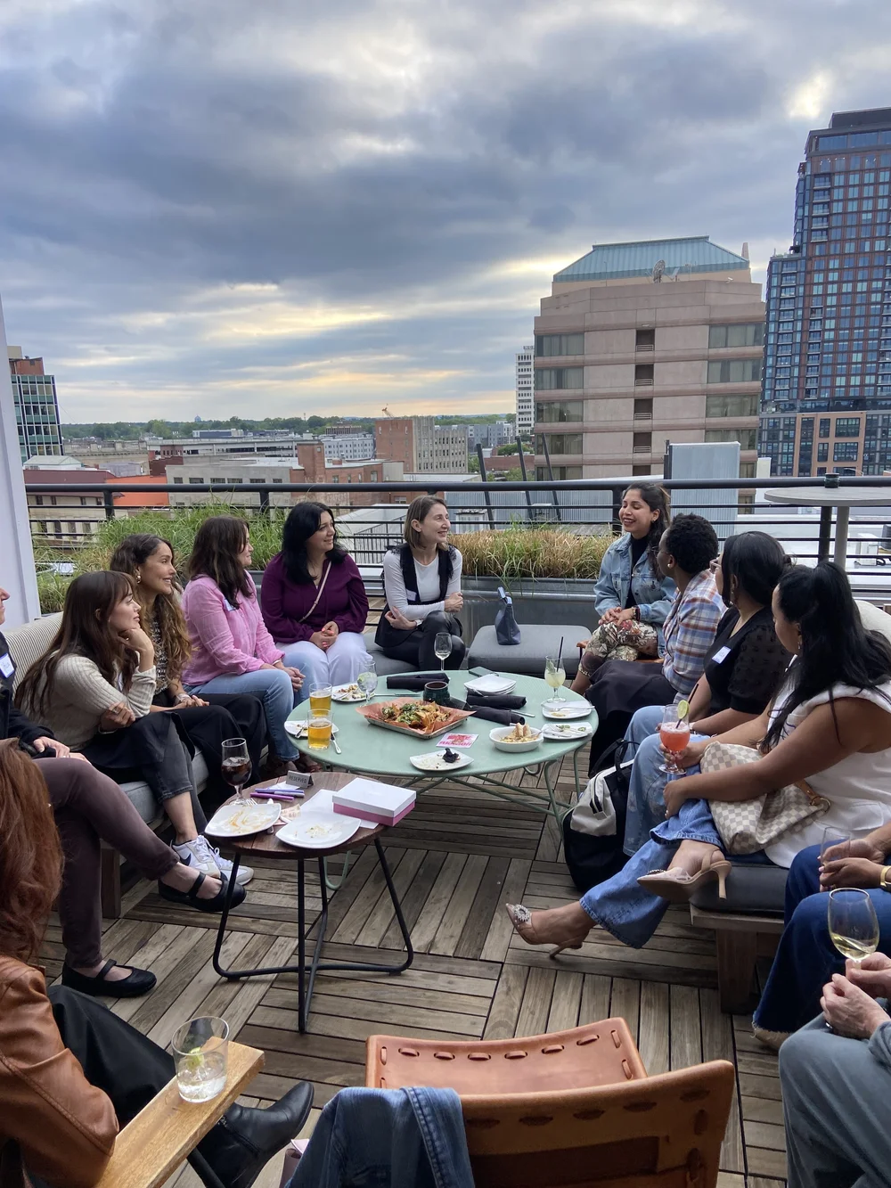 Women talking together on the rooftop at a Women's Social