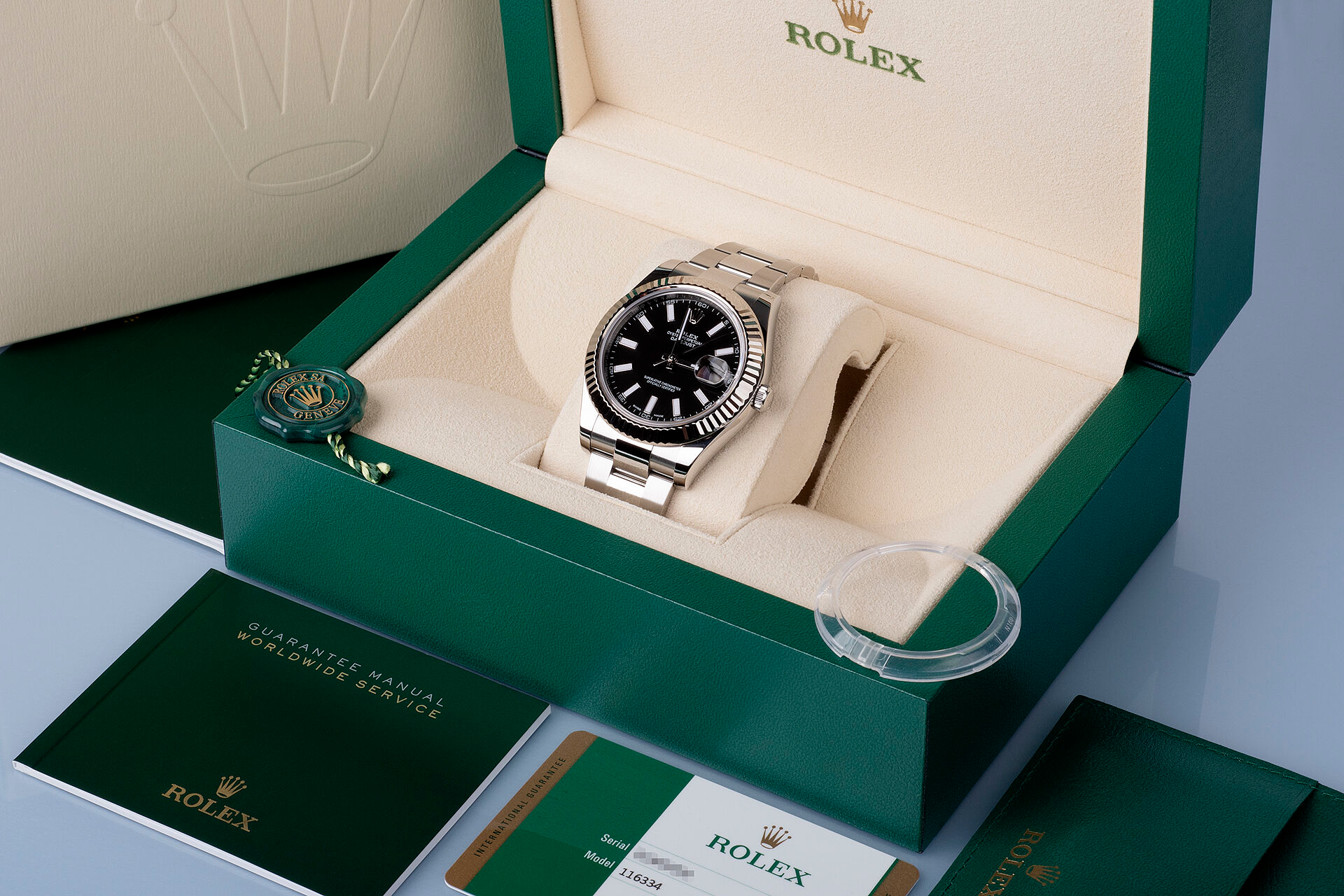 Rolex Datejust in its presentation box with accompanying accessories