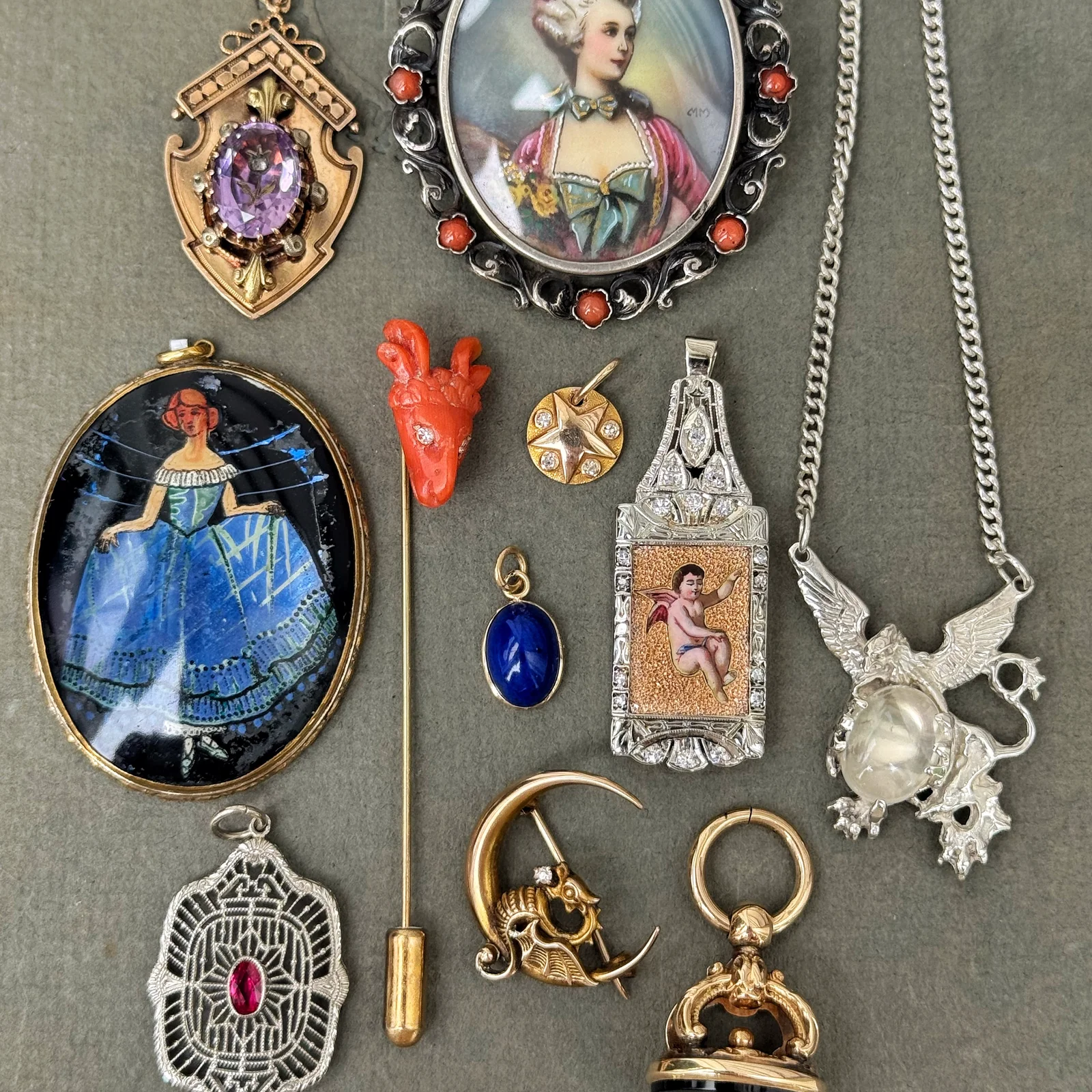 Collection of antique pendants, portrait miniatures, gemstone jewelry and a pocket watch