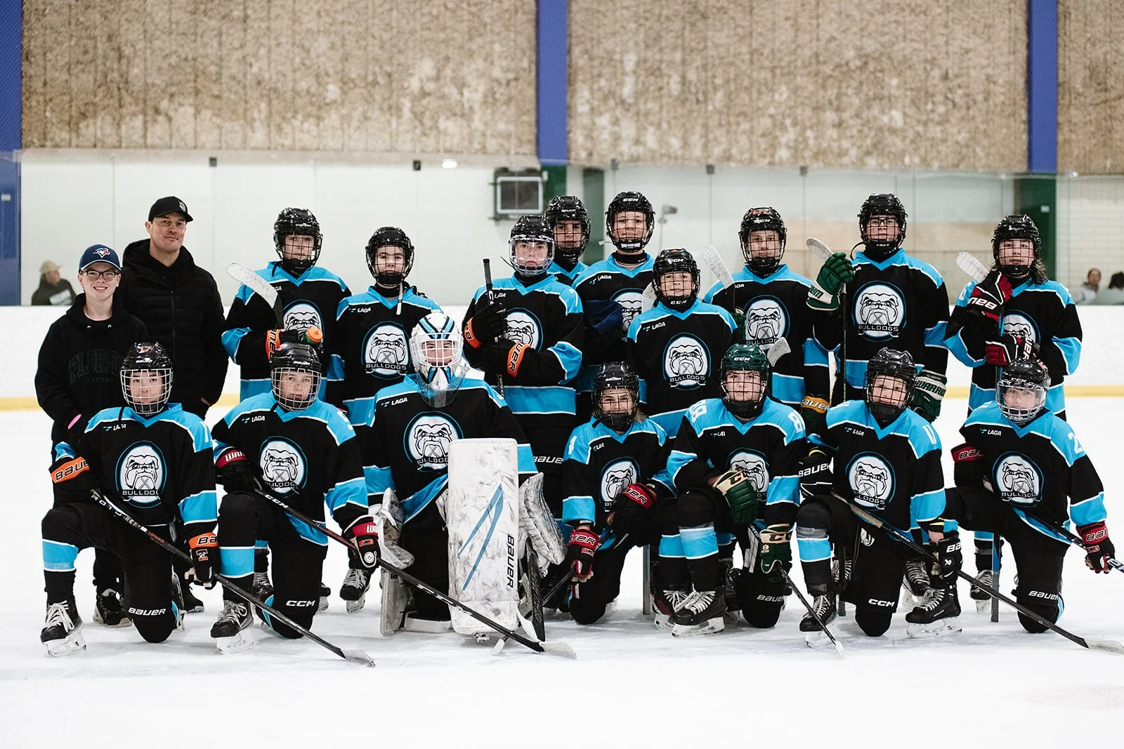 Broadstreet Bulldogs spring team photo on the ice