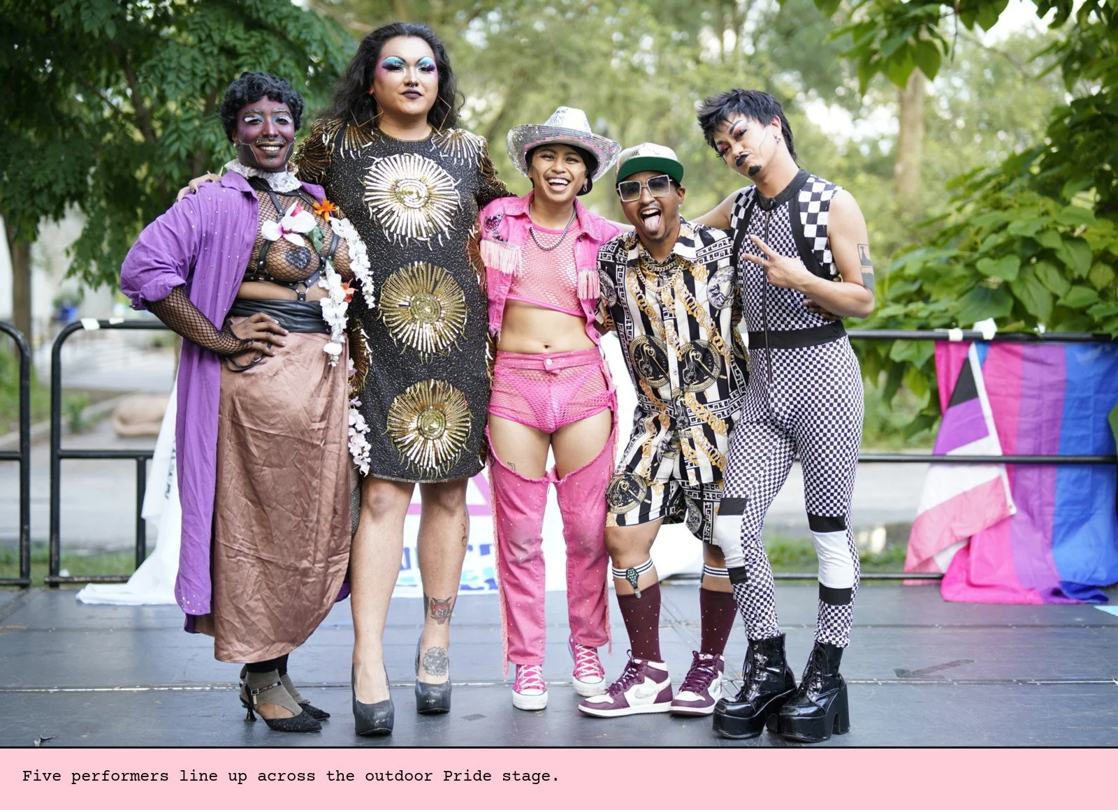 Five performers line up across the outdoor Pride stage.