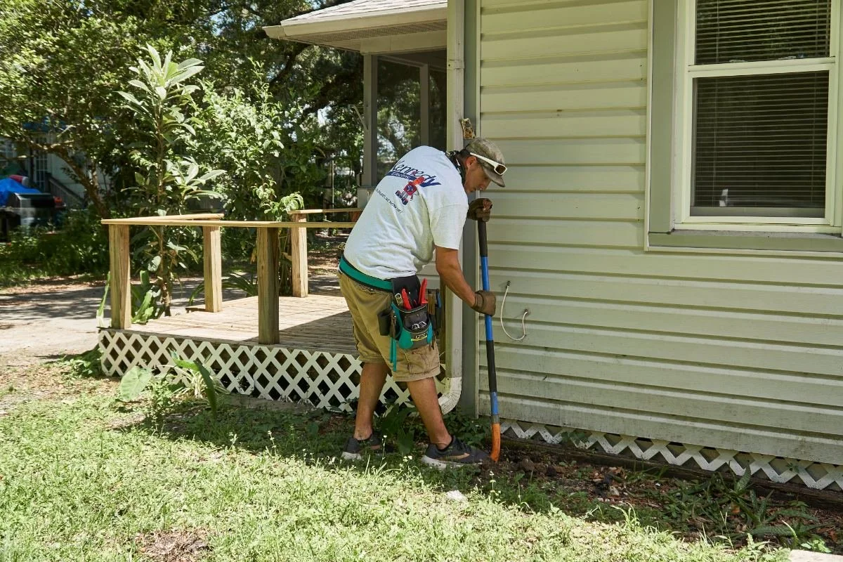 Kennedy Electric electrician working at a backyard shed