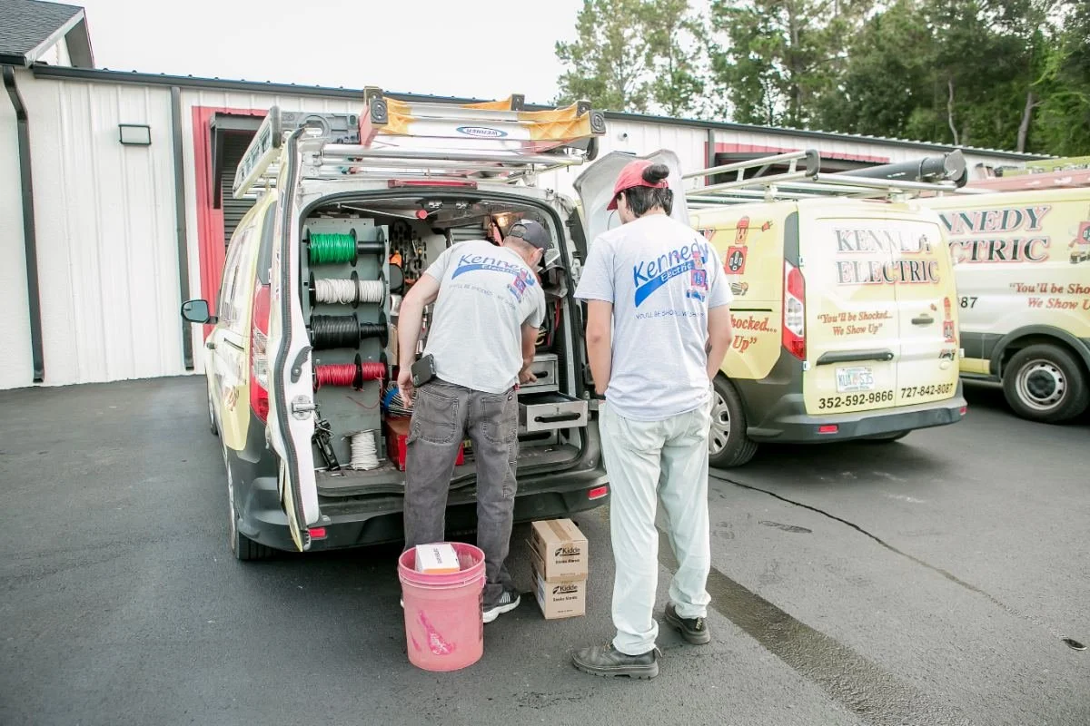 Kennedy Electric electricians at the service van