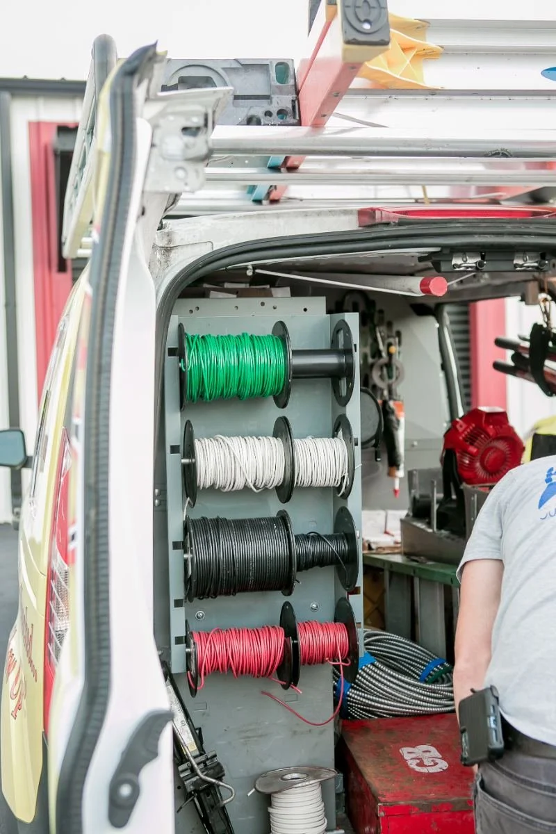Wire spools in a Kennedy Electric service van