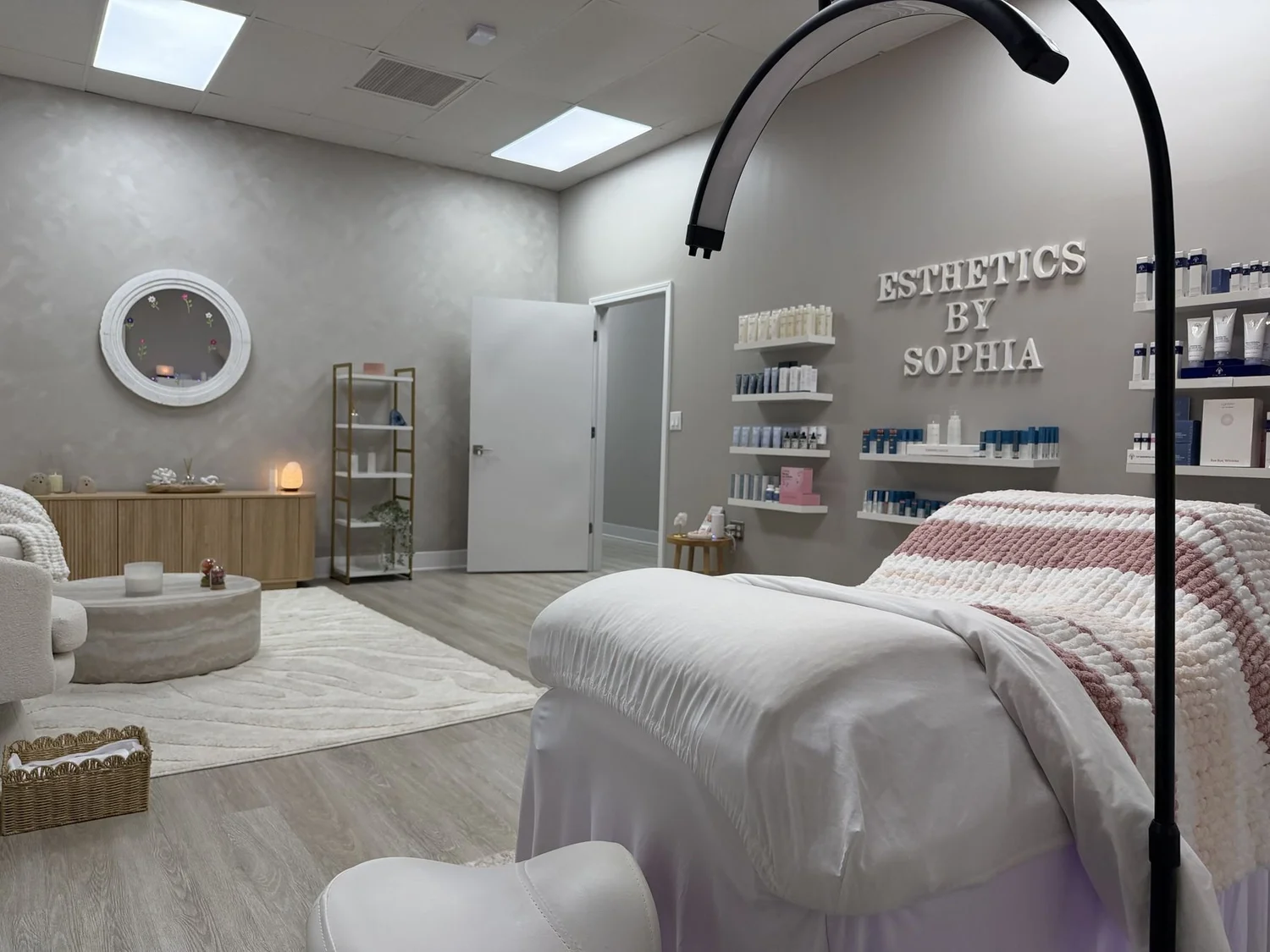 Esthetics by Sophia skincare products and treatment bed at Studio XO Salon