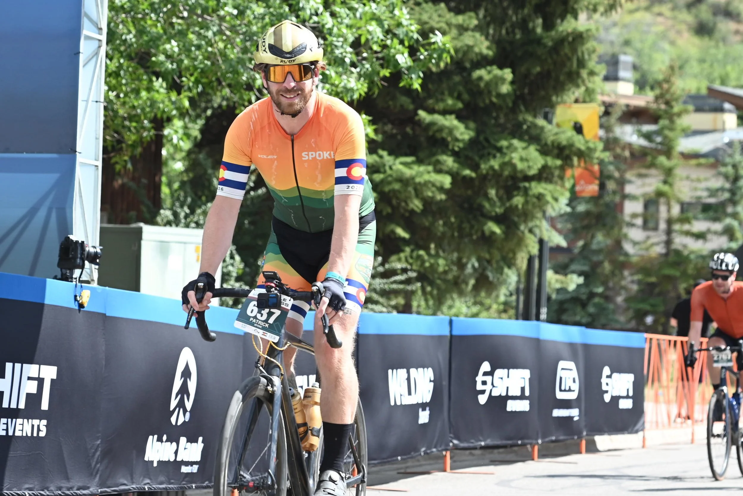 Patrick Linfante riding at Triple Bypass in his Spoke cycling jersey