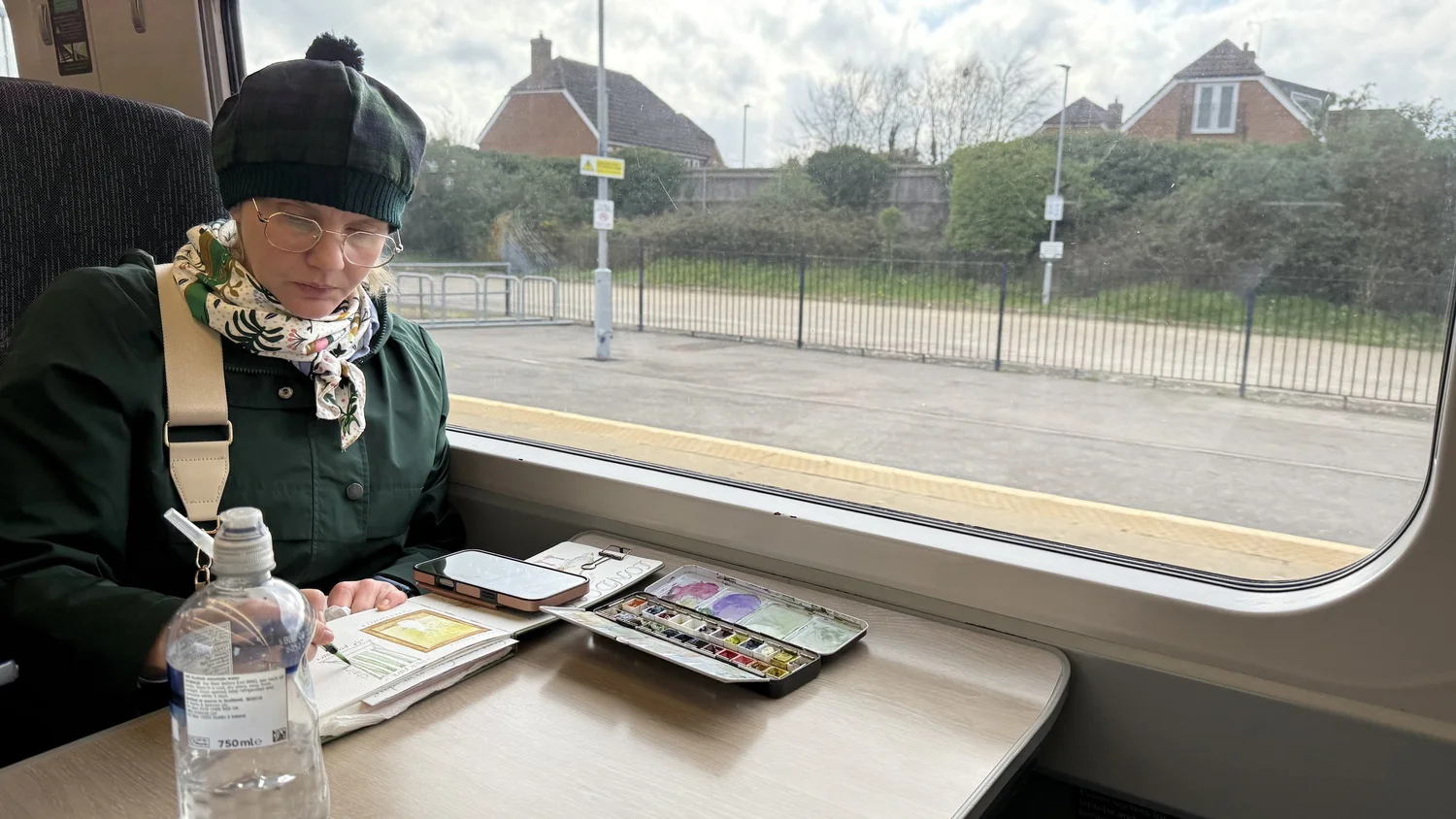 Painting watercolor on the train
