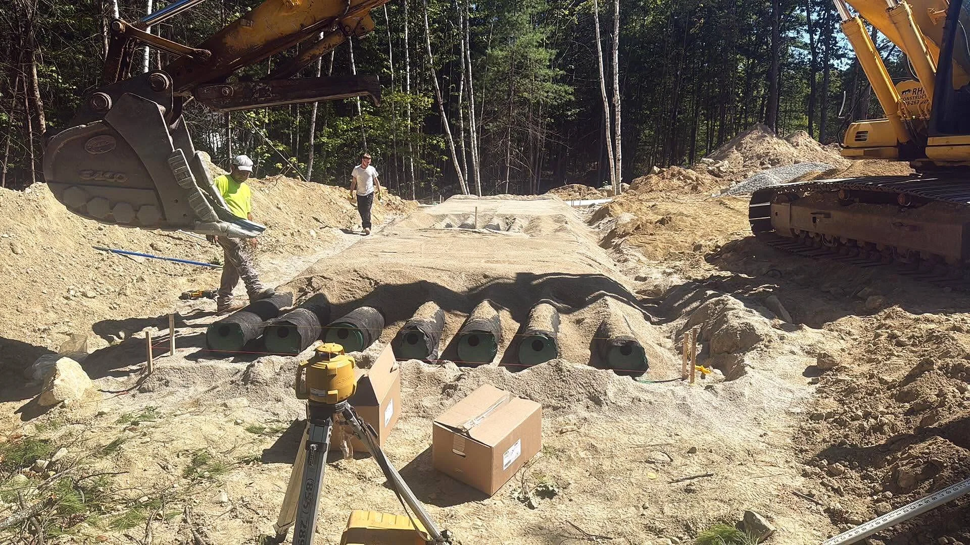 Excavation and site preparation with heavy equipment