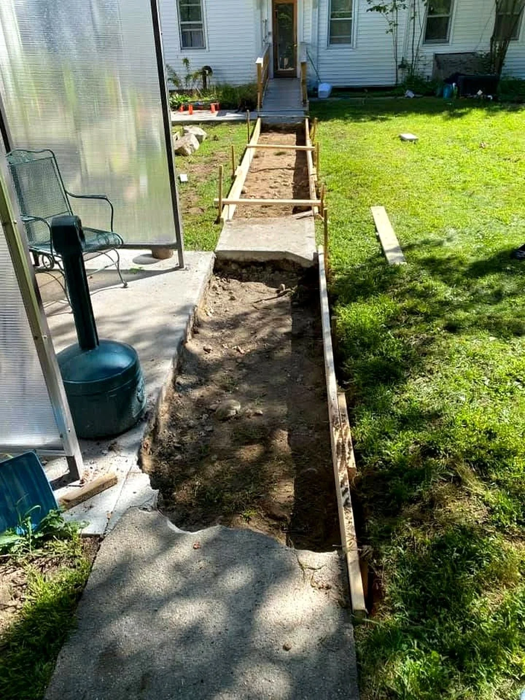 Residential walkway excavation and wood forms