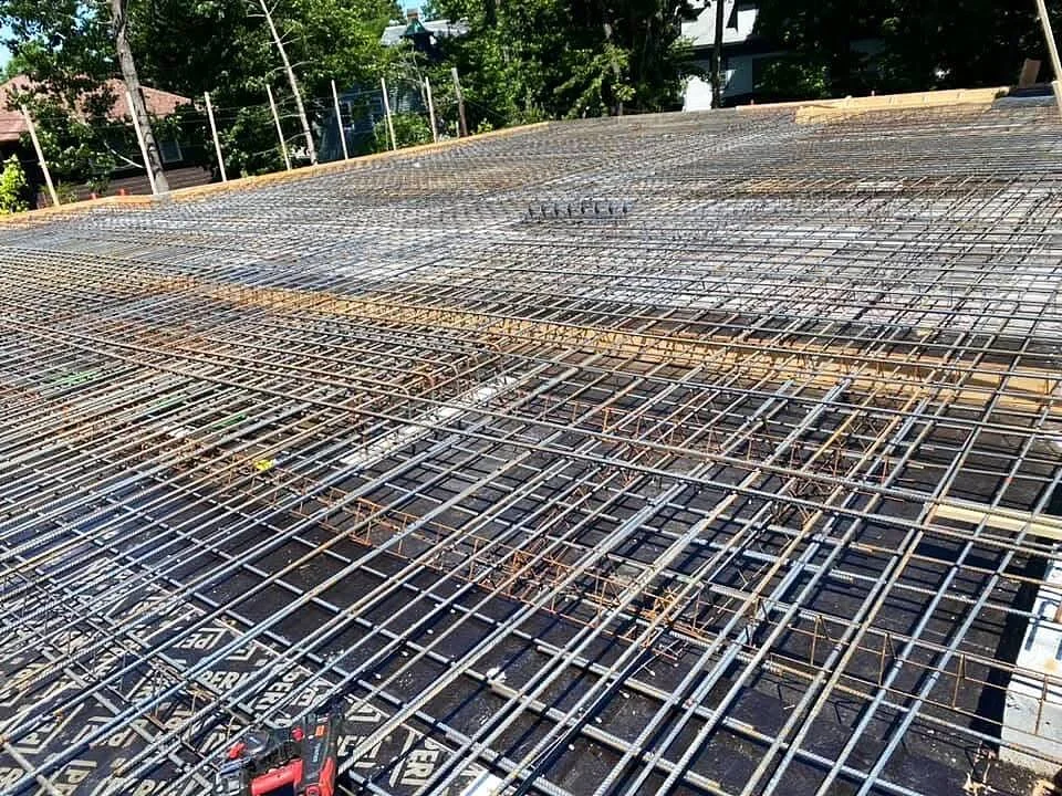 Steel reinforcing grid before concrete placement