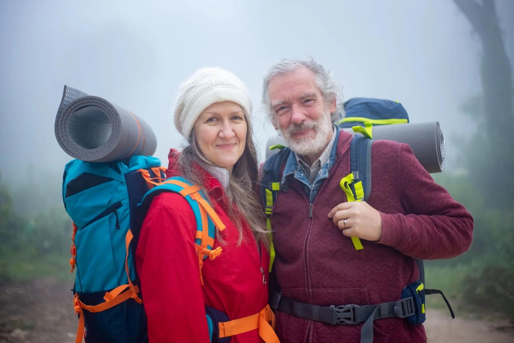 Smiling adult couple outdoors