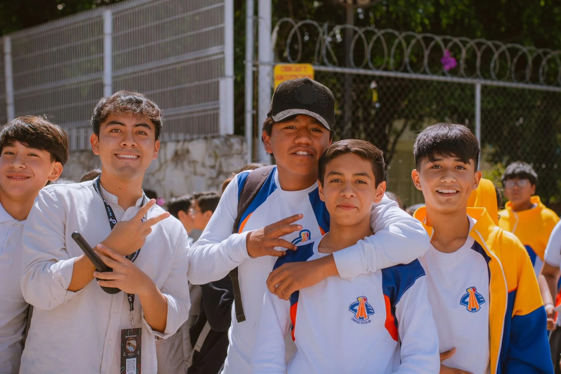 Group of teenage friends smiling outdoors