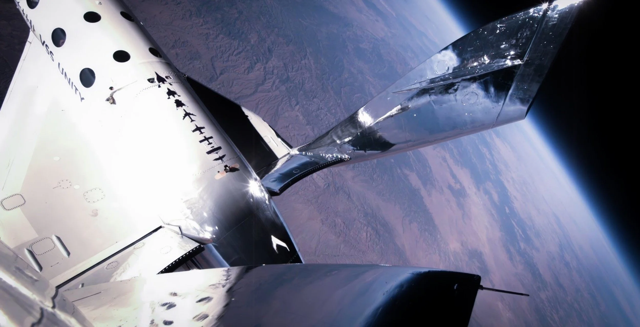 Virgin Galactic spaceship above the Earth