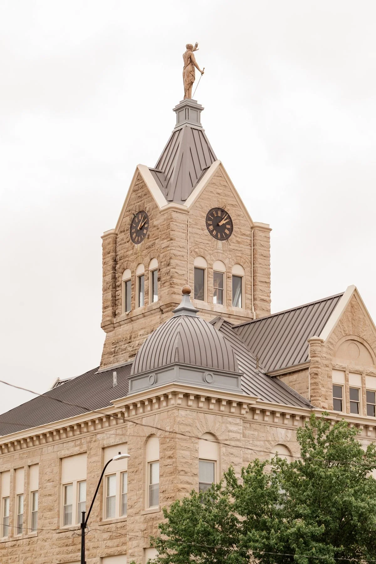 The courthouse clock tower on the Bolivar square.
