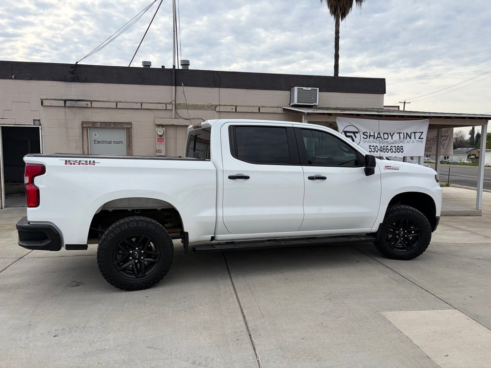 White Chevy Silverado pickup with window tint at Shady Tintz, Yuba City