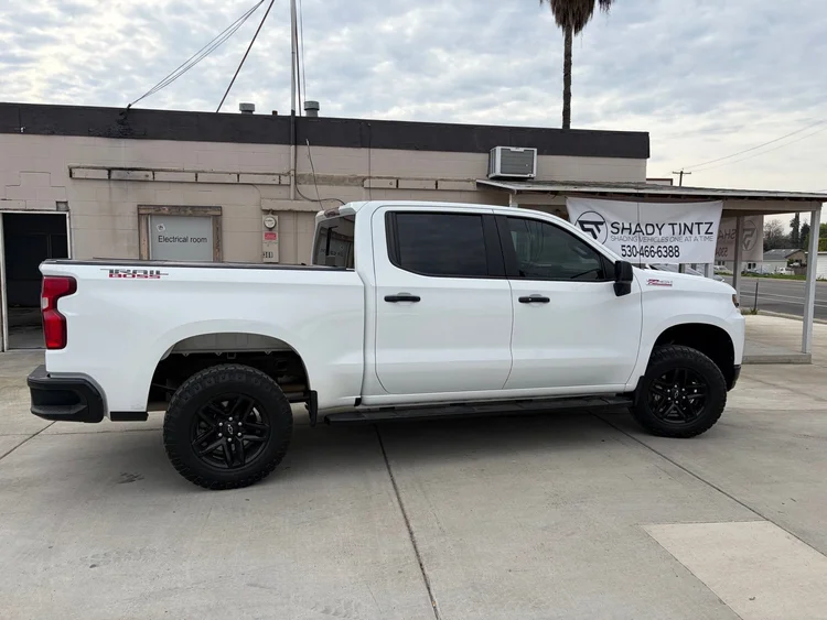 White Chevy Silverado pickup with window tint at Shady Tintz, Yuba City