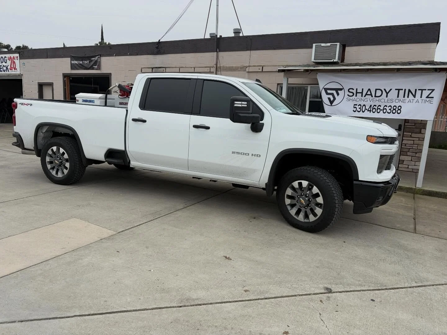 White Chevy Silverado HD with window tint at Shady Tintz, Yuba City