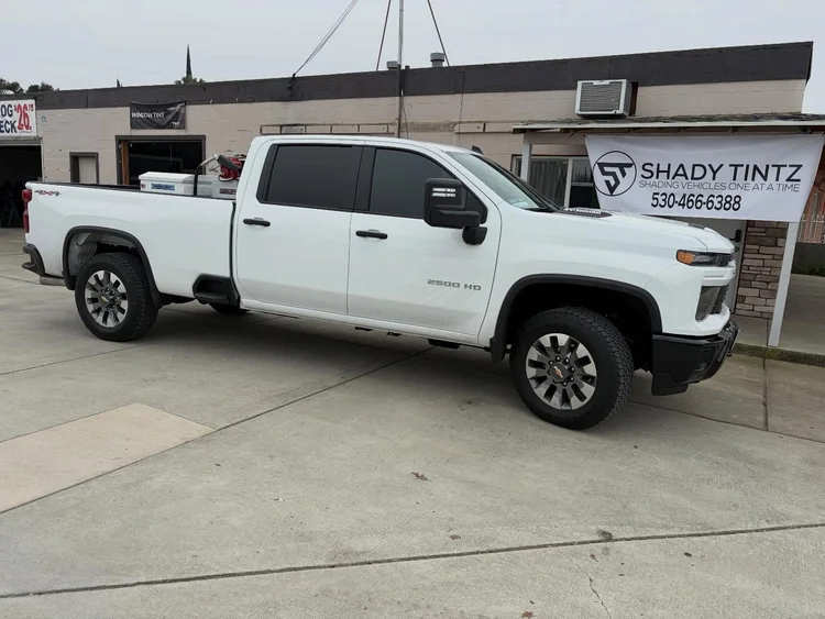 White Chevy Silverado HD with window tint at Shady Tintz, Yuba City