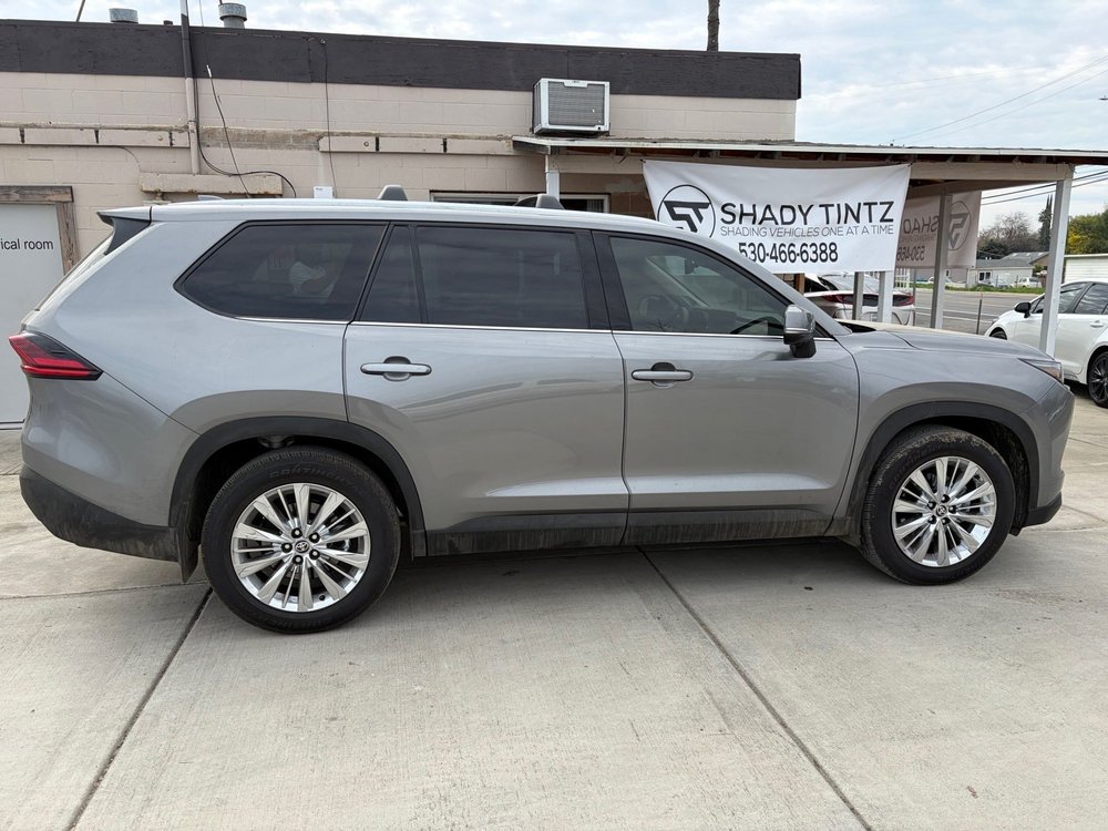 Gray Toyota 3-row SUV with carbon window tint at Shady Tintz, Yuba City