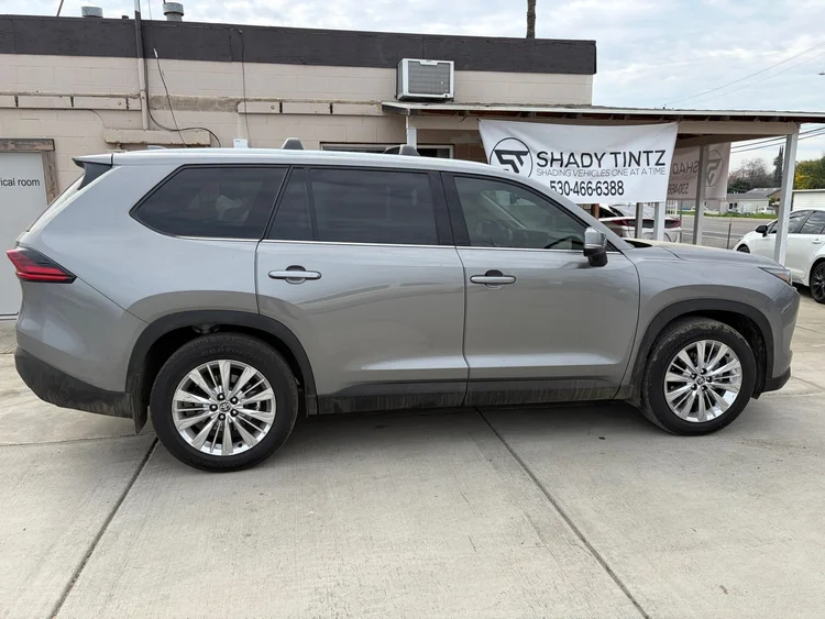 Gray Toyota 3-row SUV with carbon window tint at Shady Tintz, Yuba City