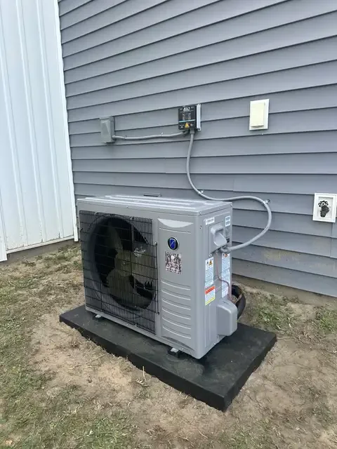 Side-discharge HVAC unit with electrical disconnect and monitor