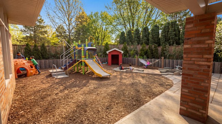 View from the covered porch across the Ronald McDonald House play yard