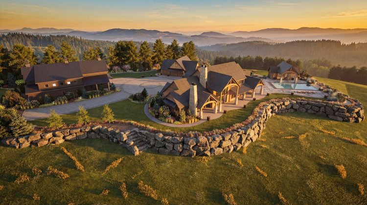 Solitude estate at sunset ringed by a boulder retaining wall above forested hills