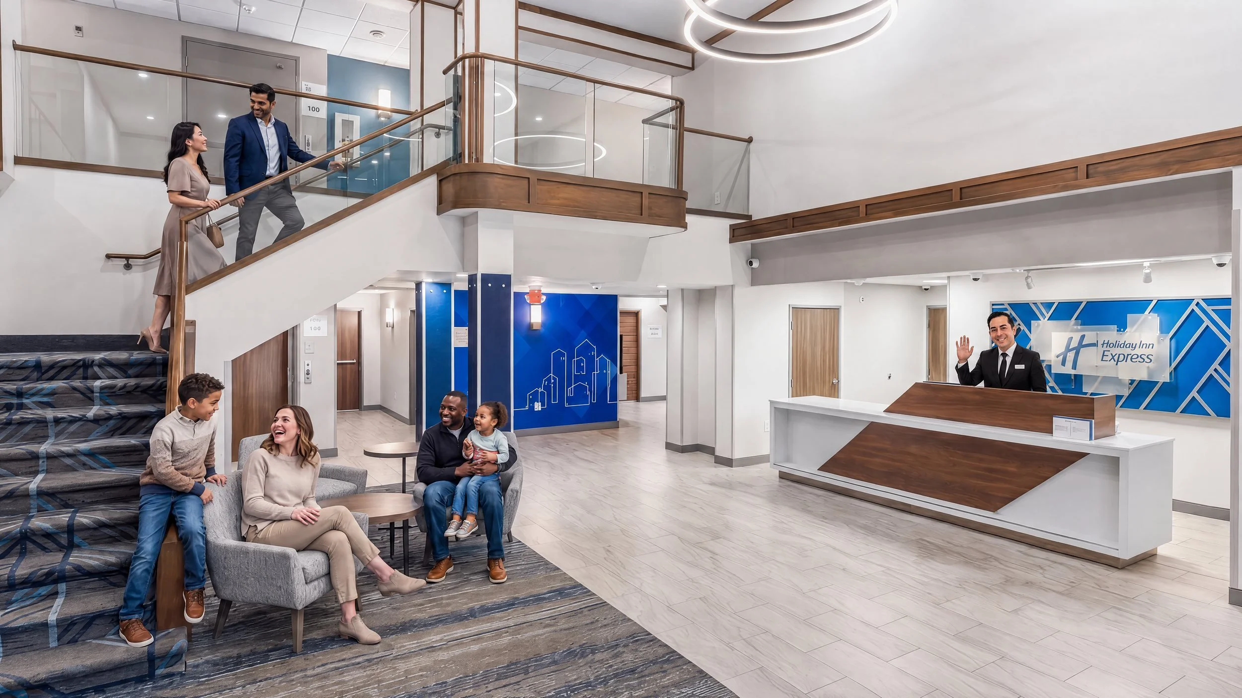 Holiday Inn Express lobby with a double-height stair, lounge seating and the front desk