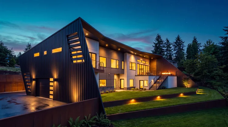 Dennis Residence, exterior and terraced lawn at dusk