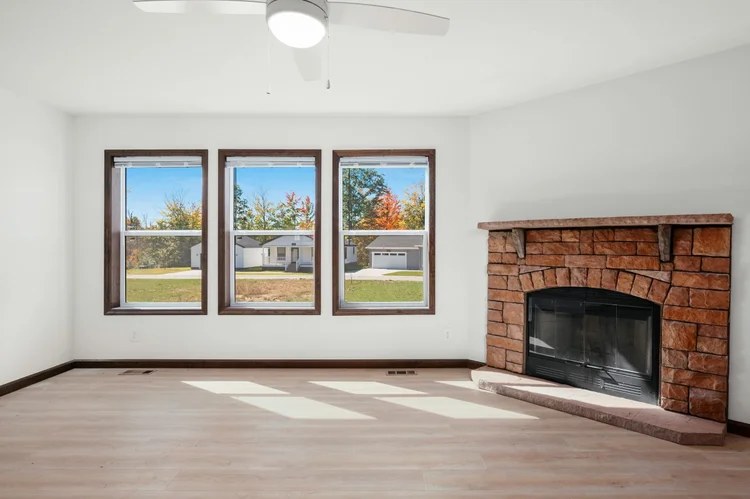 Living room fireplace and windows