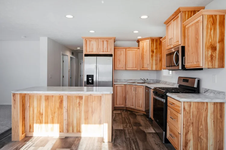 Kitchen island and stainless appliances