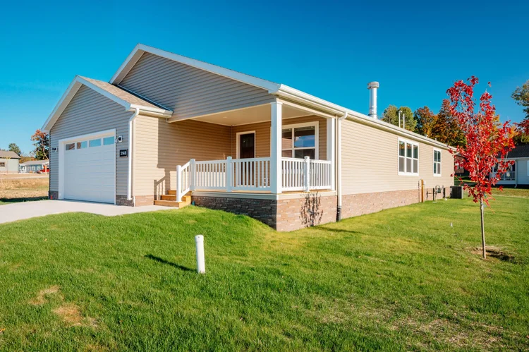 Side of the home and covered porch