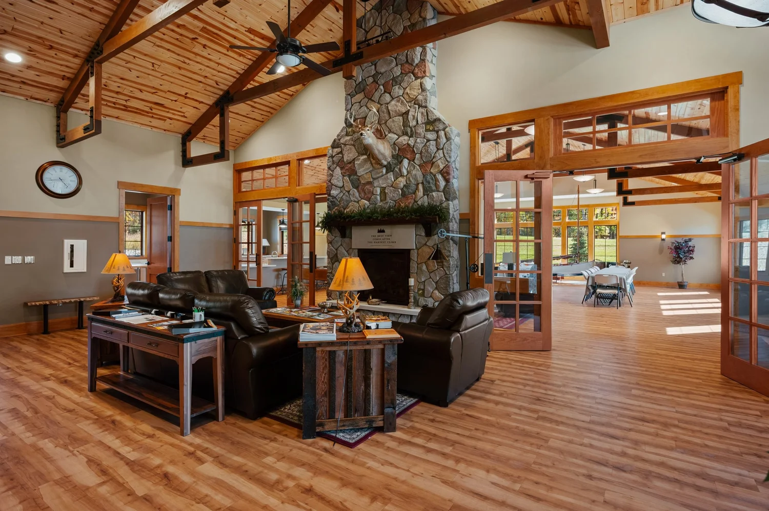 Great room with a fieldstone fireplace inside the Alta Vista Lodge