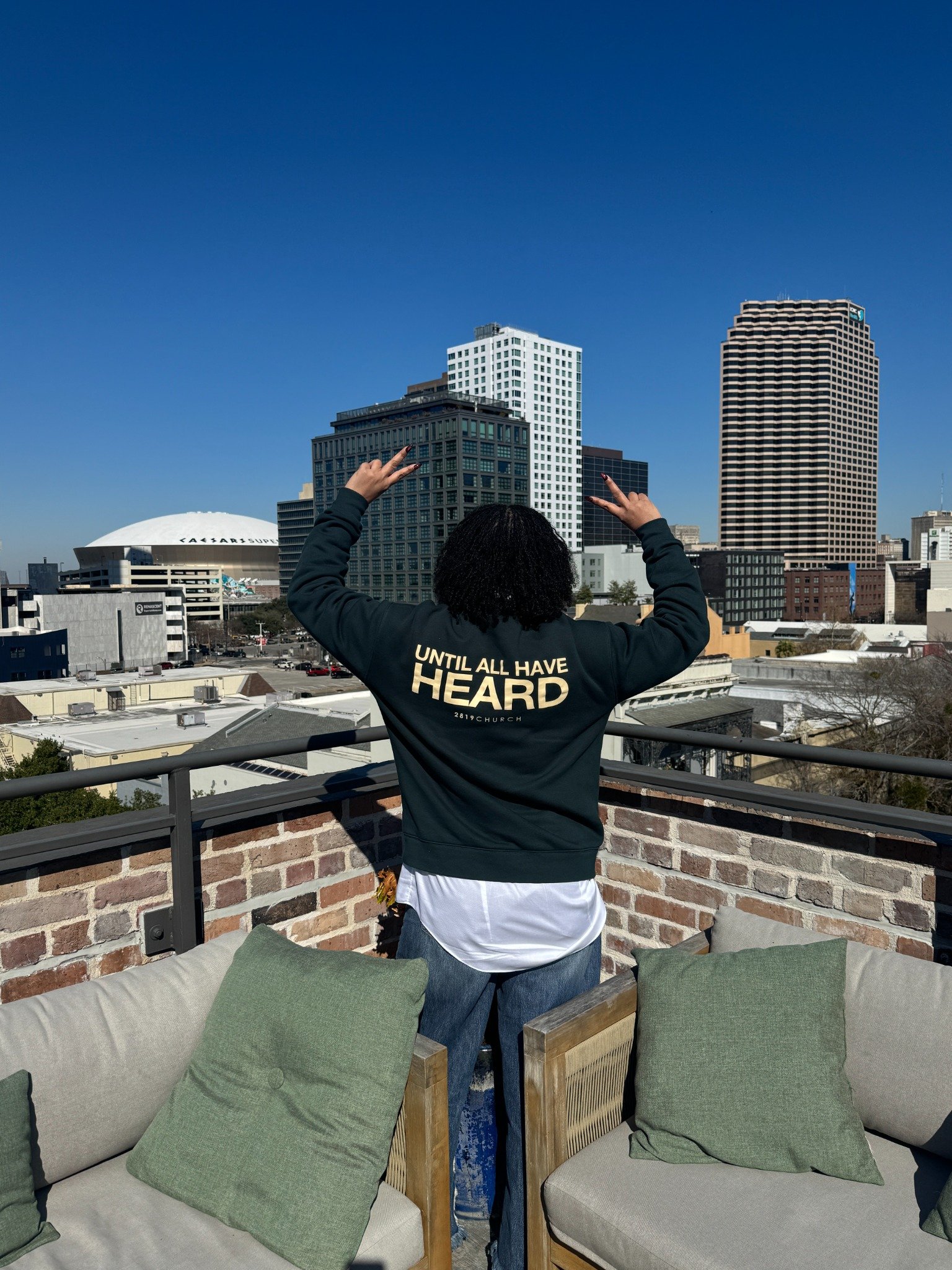 Nisha overlooking the Baltimore skyline