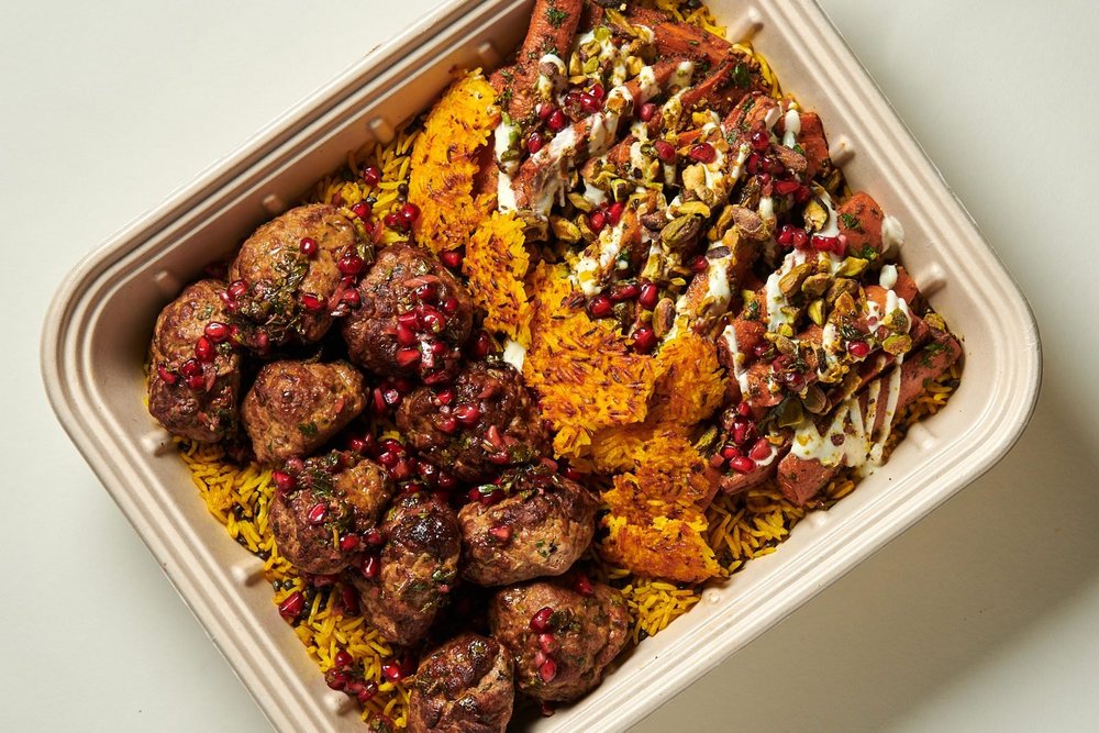 Turkey meatballs over turmeric rice with tahdig and harissa carrots