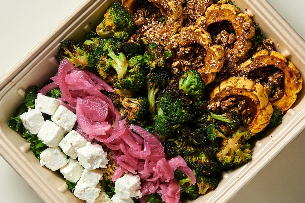 Fall harvest tray with broccoli, delicata squash, pickled onion and feta