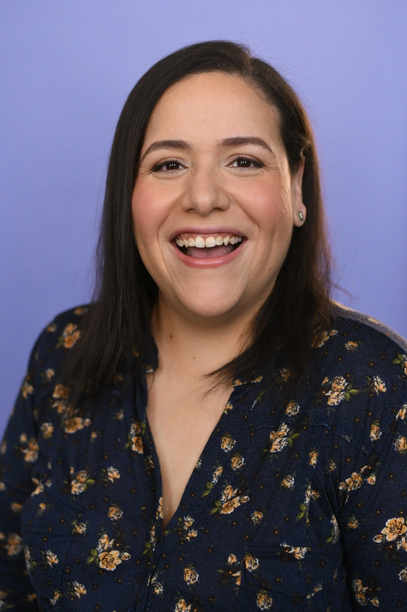 Villy laughing during her headshot shoot.