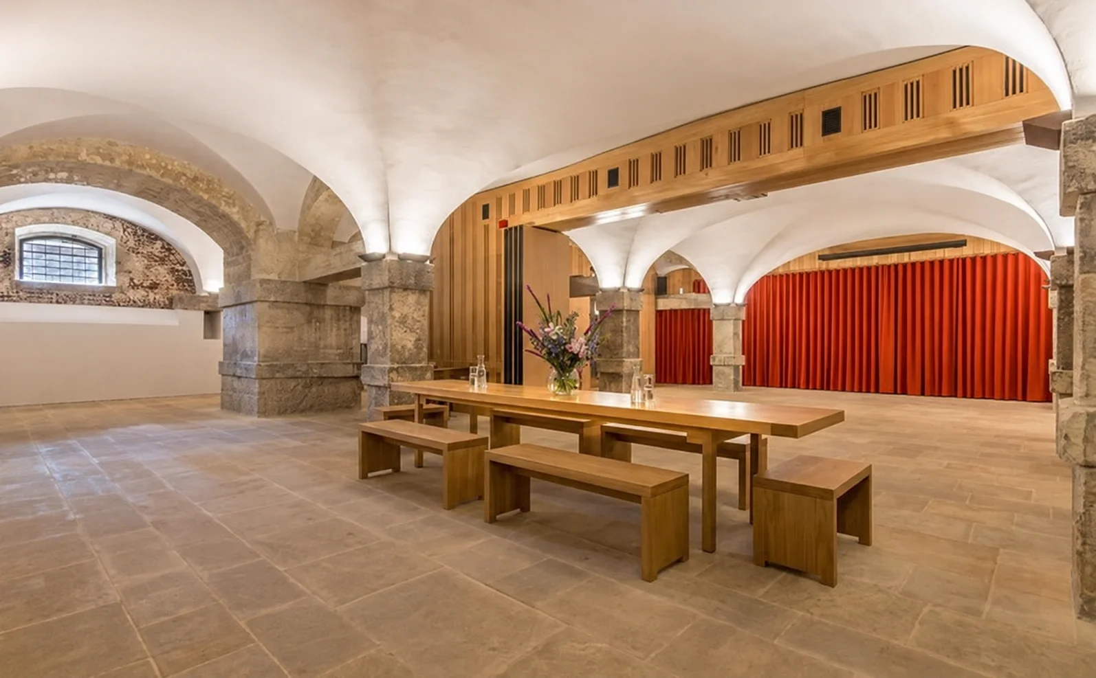The contemporary oak-panelled Crypt interior