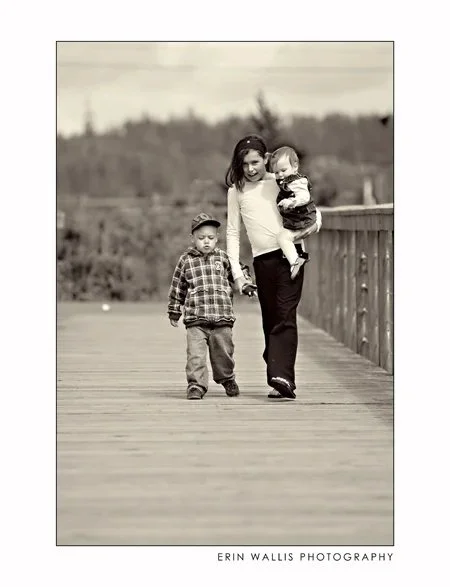Big Sister walking with siblings