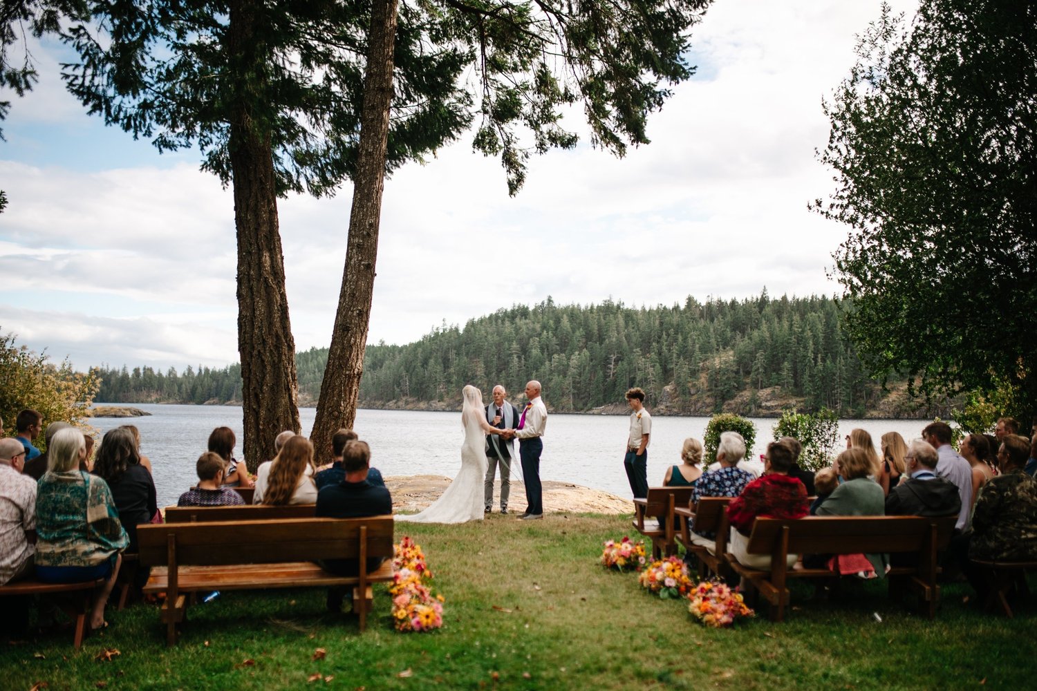 The ceremony beneath the trees