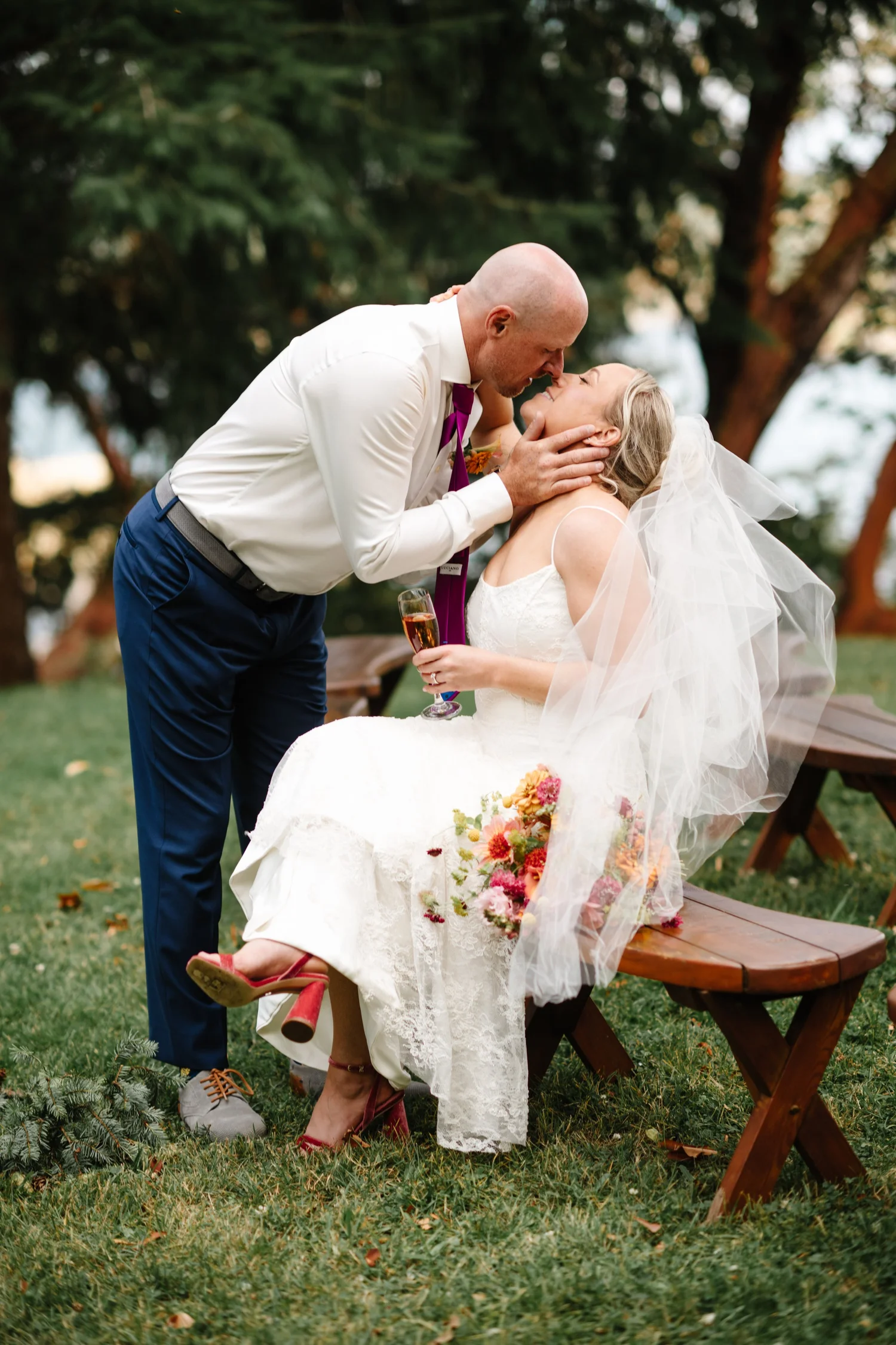 Kyle kissing Hailey on the lawn