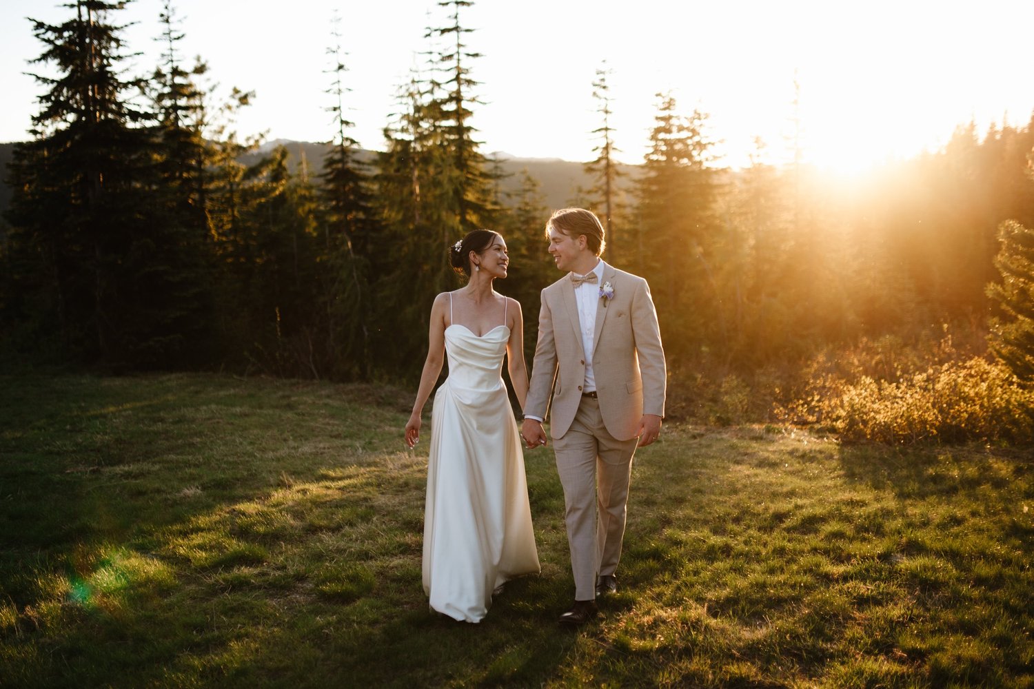 Rea and Zach walking in golden light