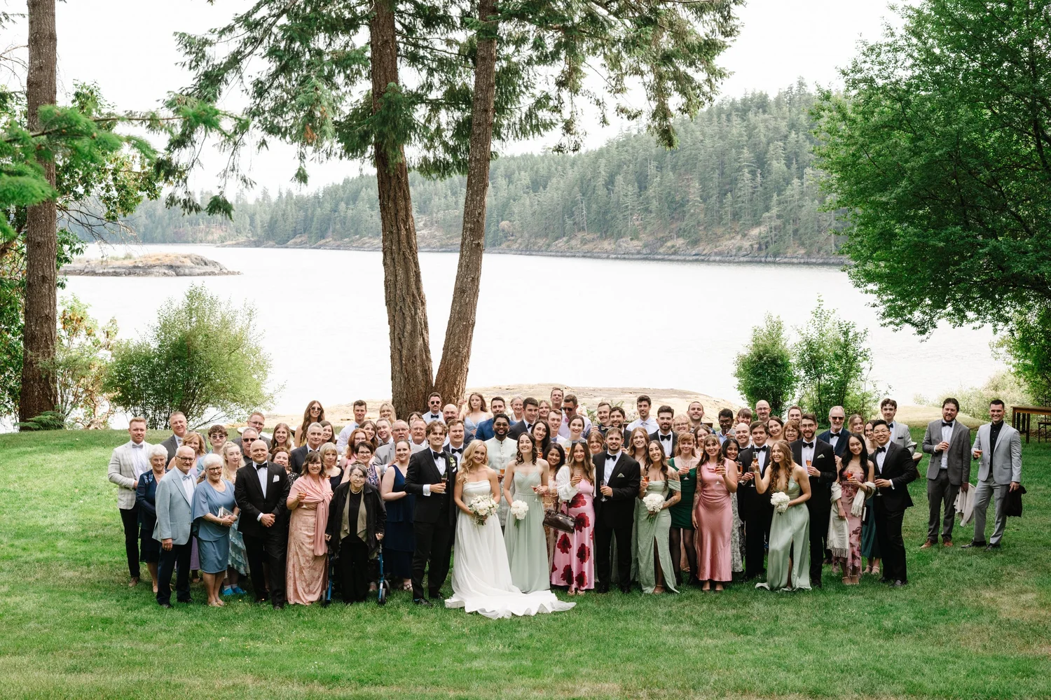 Everyone together on the lawn by the water