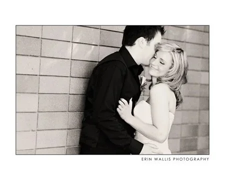 A kiss by the bricks