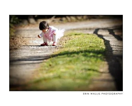 little girl in tutu on the road