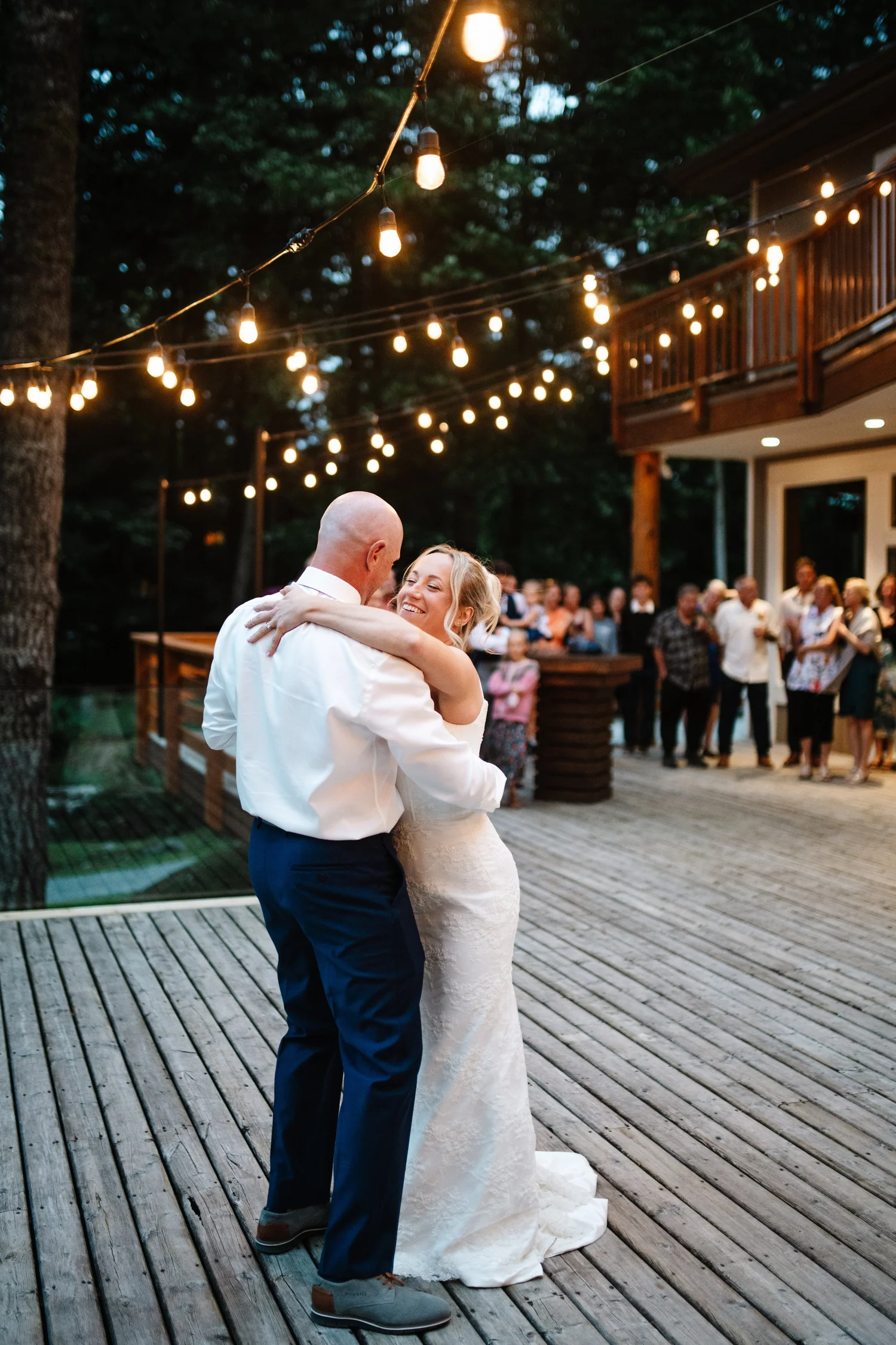 Hailey and Kyle’s first dance under the string lights