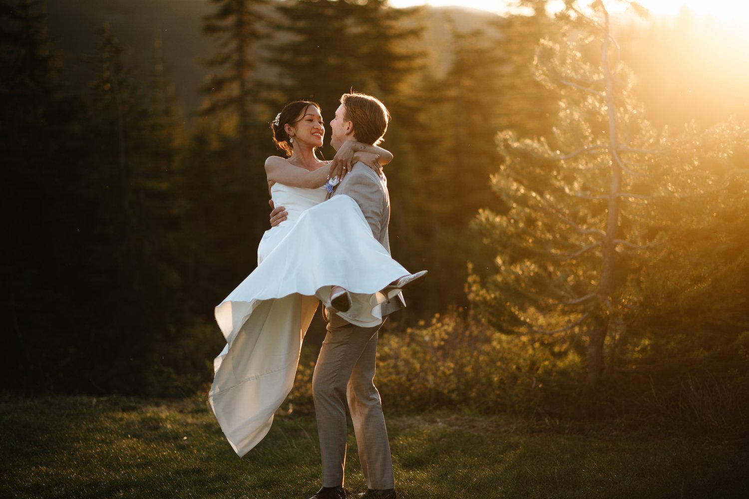 Zach lifting Rea in the golden light