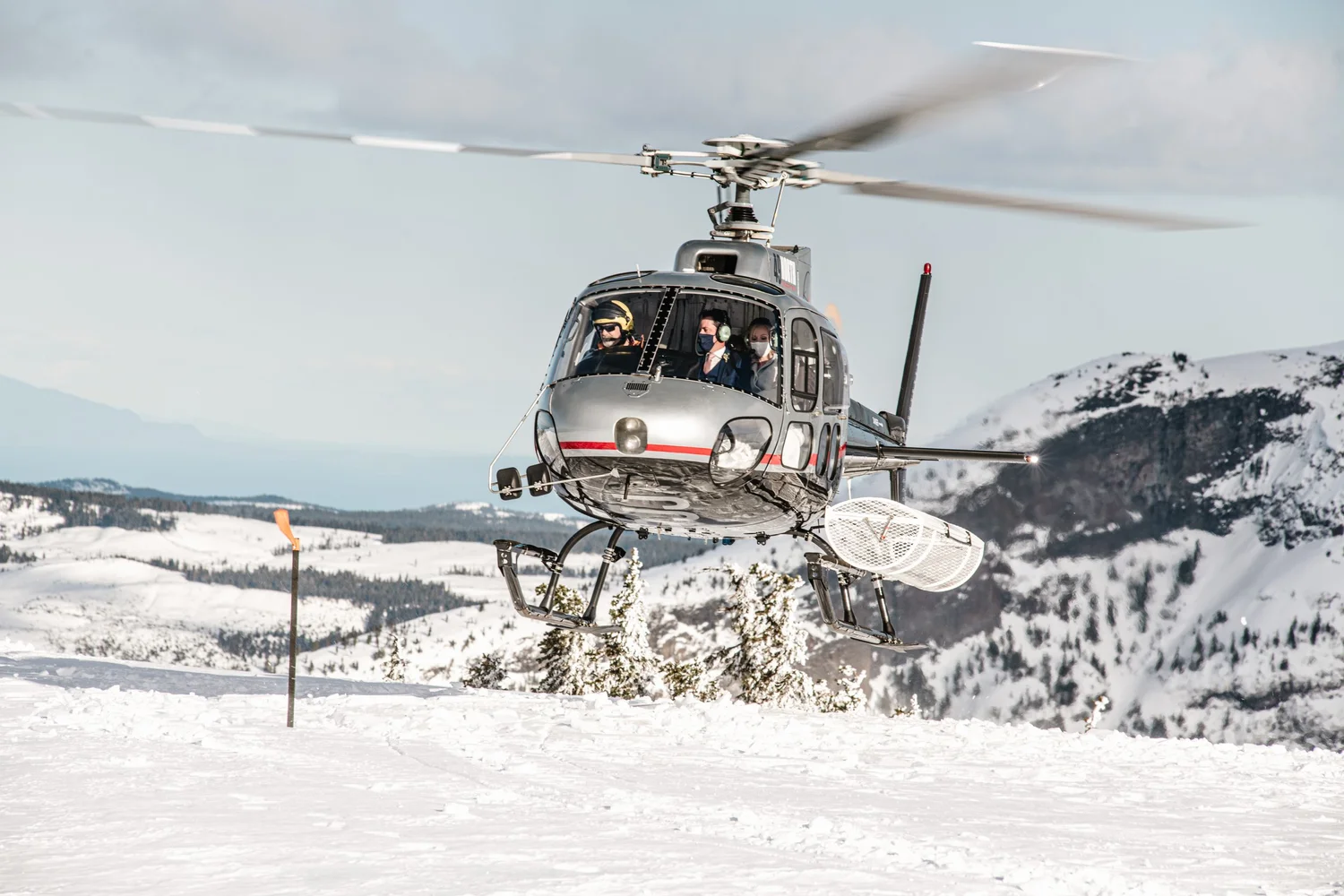 A helicopter resting on the snow